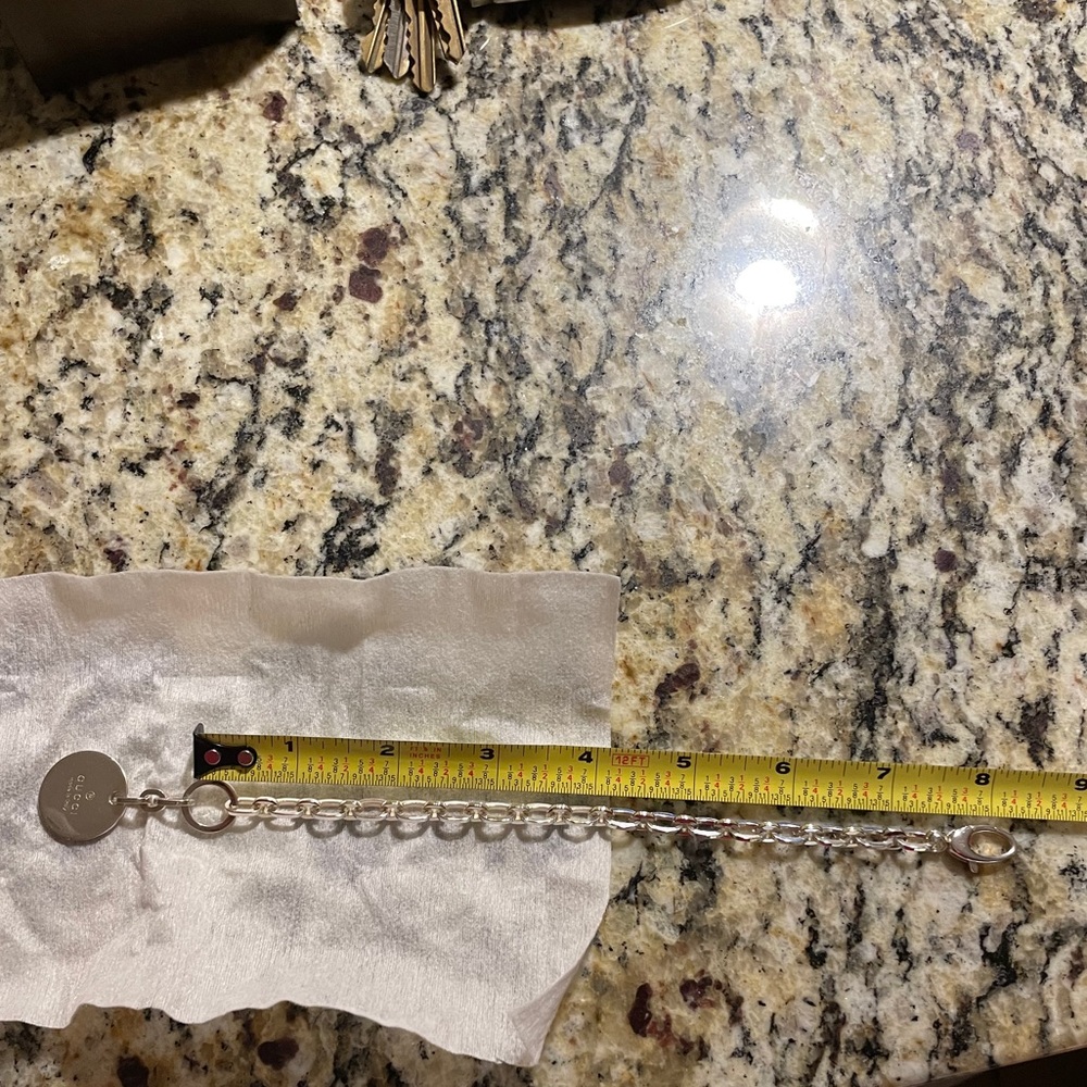 Gucci silver bracelet bangle pendant medallion